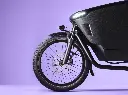 UA_FamilyNext_purple_frontfork_lights_on.webp